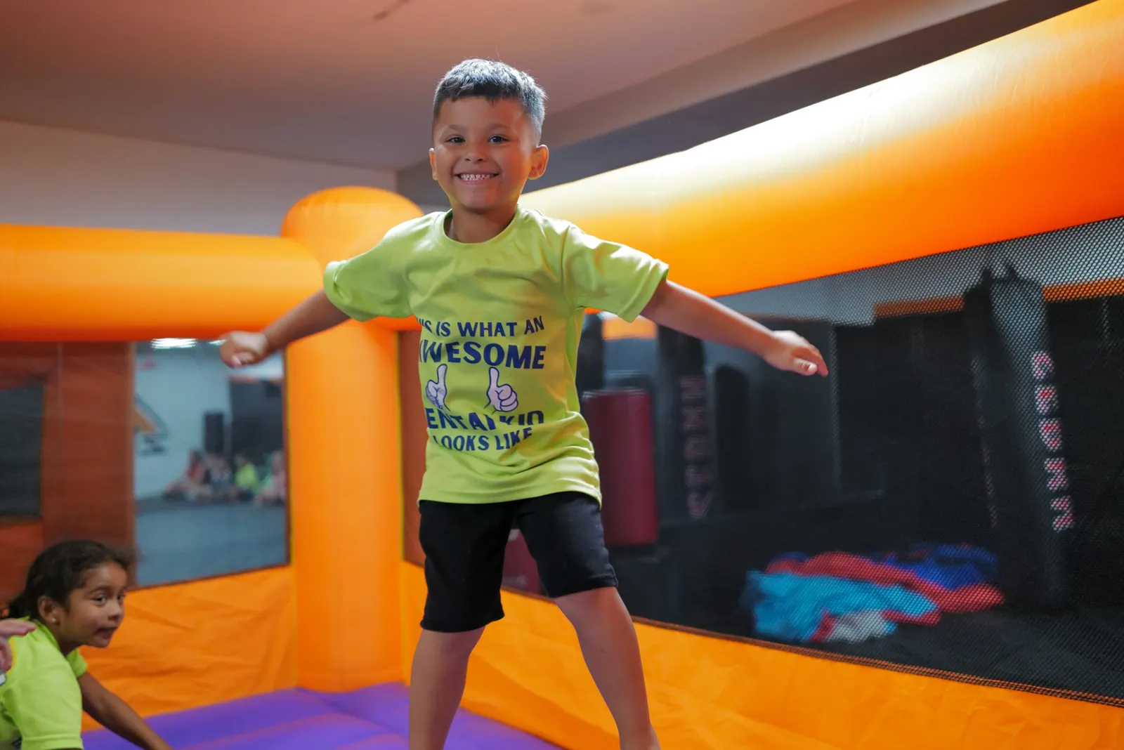 ZENTAI Summer Camp kid on bounce house