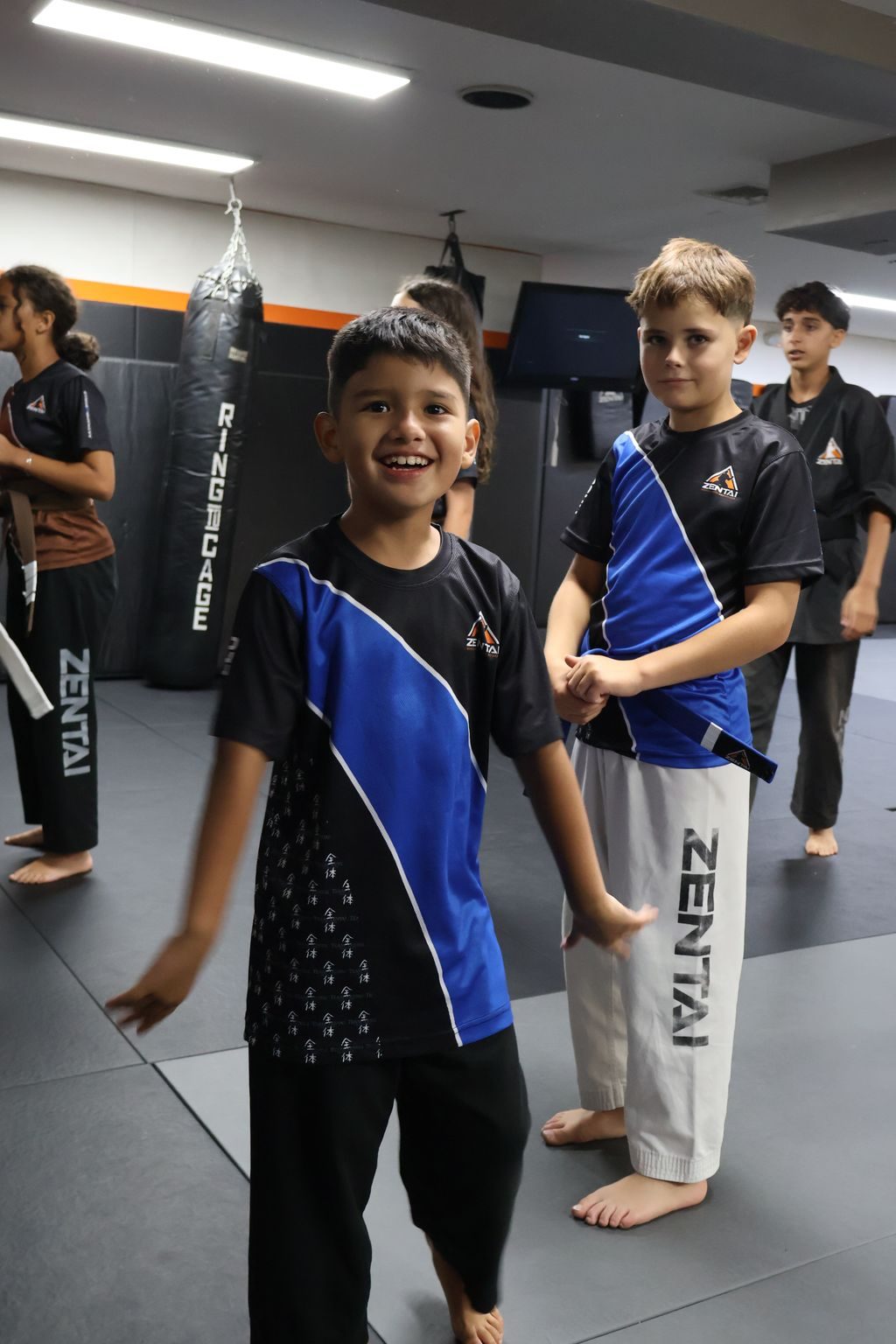 Boys laughing during class at ZENTAI Martial Arts in North Arlington, NJ