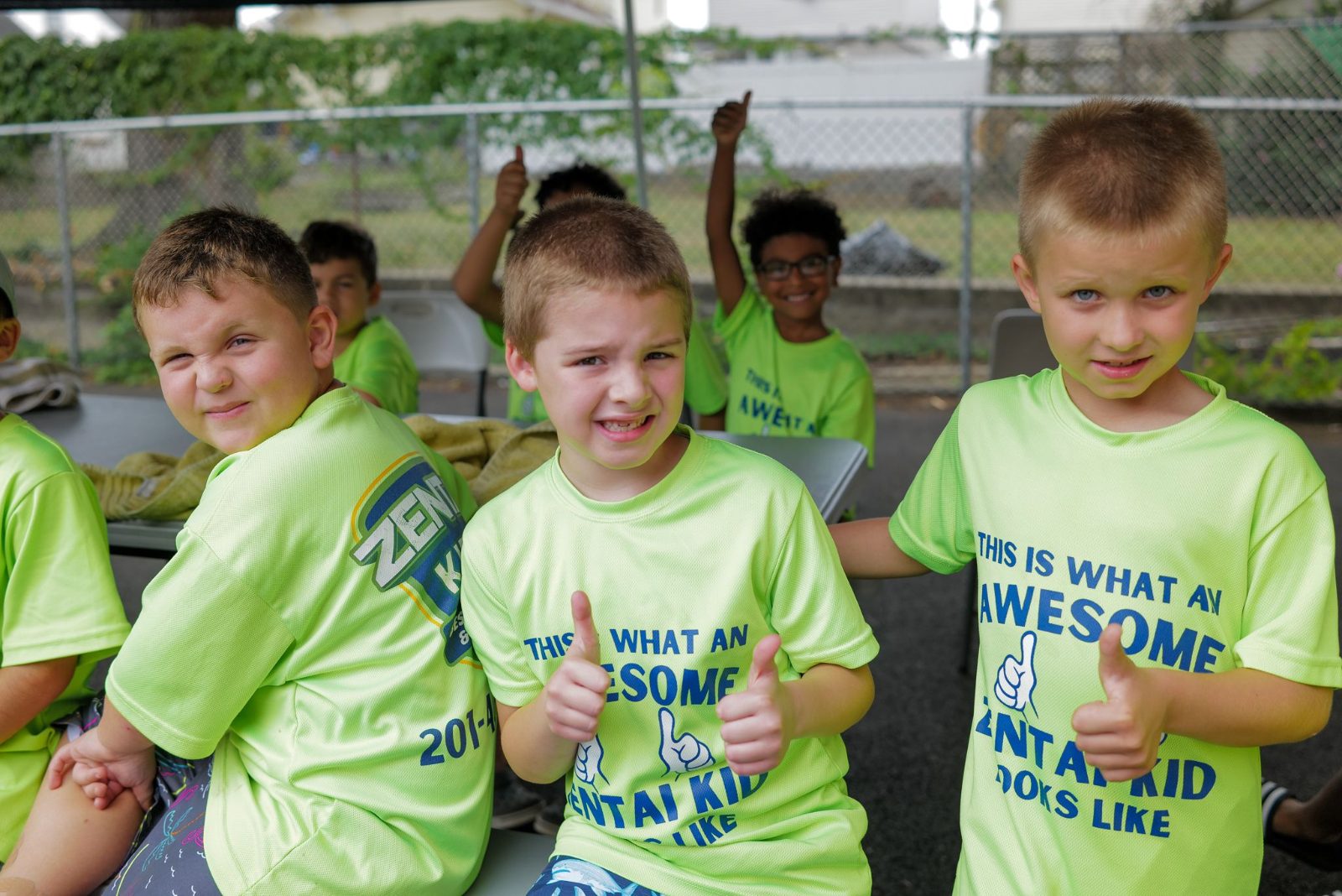 Summer campers giving thumbs up at ZENTAI Martial Arts summer camp in New Jersey