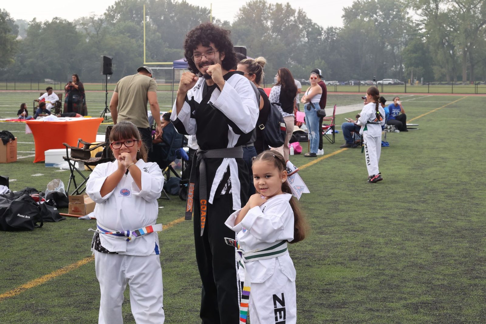 Instructor with young students at a belt promotion in New Jersey