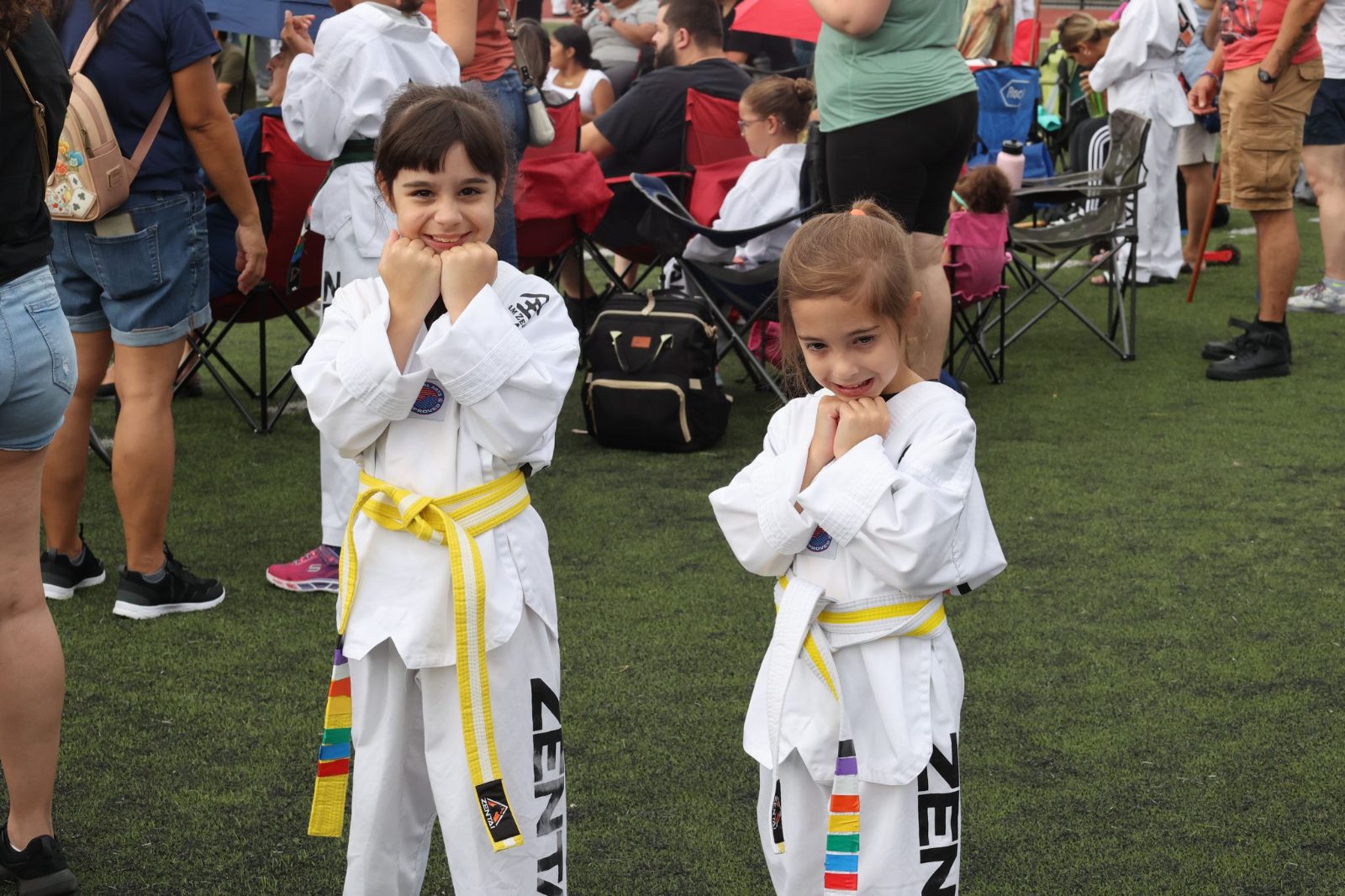 Two young yellow belts at a belt promotion in New Jersey