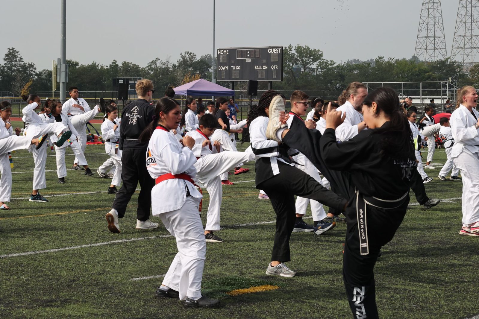 Students and black belts training together at the ZENTAI Mega Belt Promotion in New Jersey