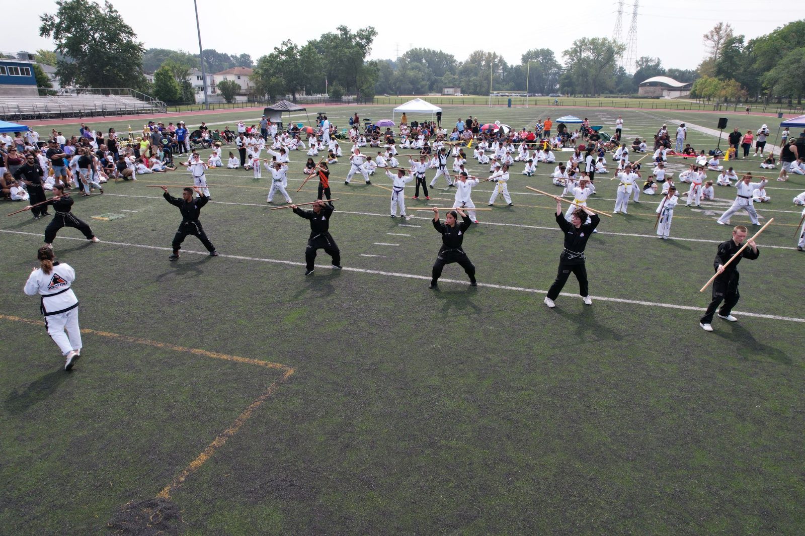 Instructors leading rows of students at the ZENTAI Mega Belt Promotion in New Jersey