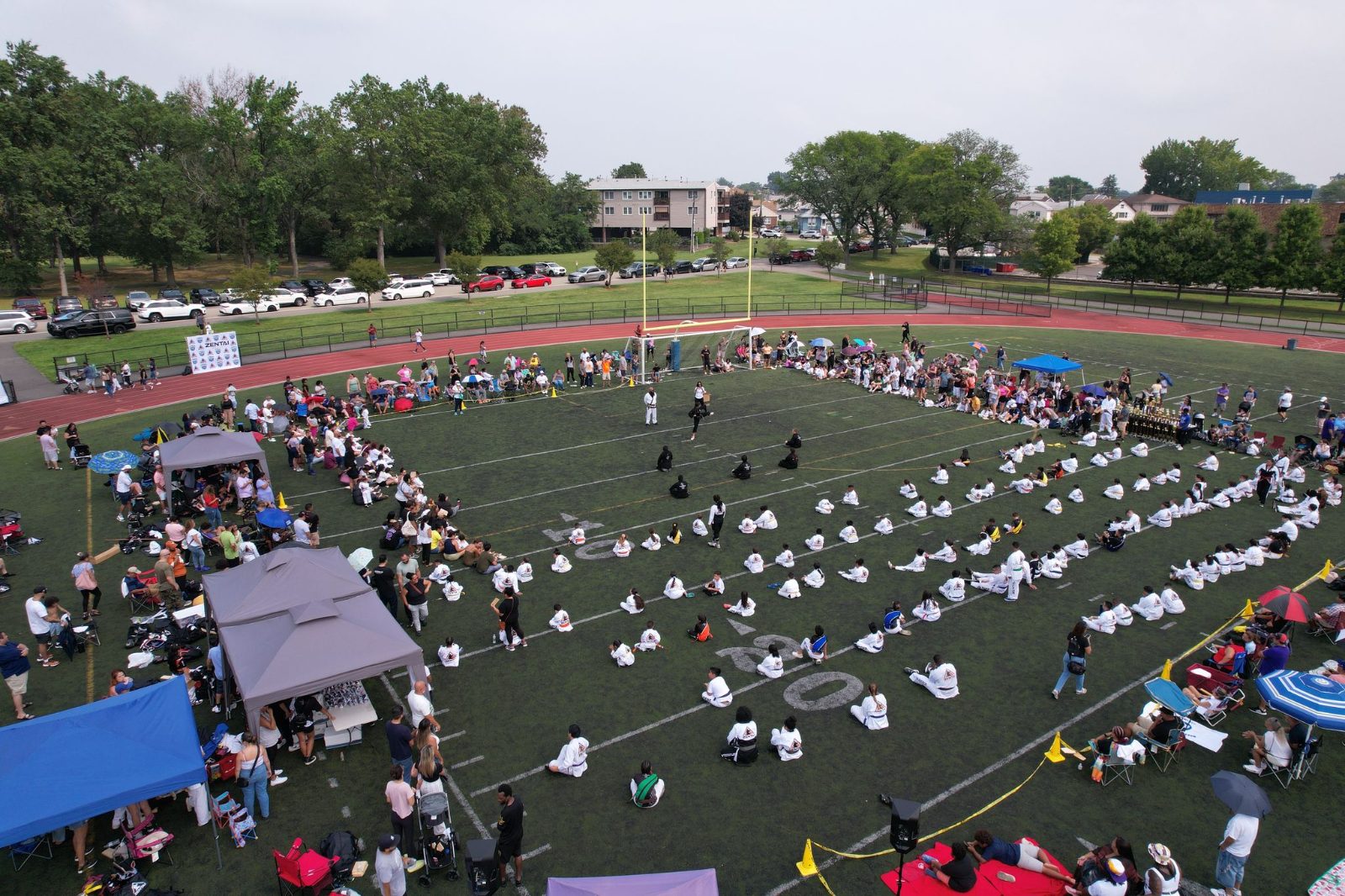 Overhead view of tents and students at the event at the ZENTAI Mega Belt Promotion in New Jersey