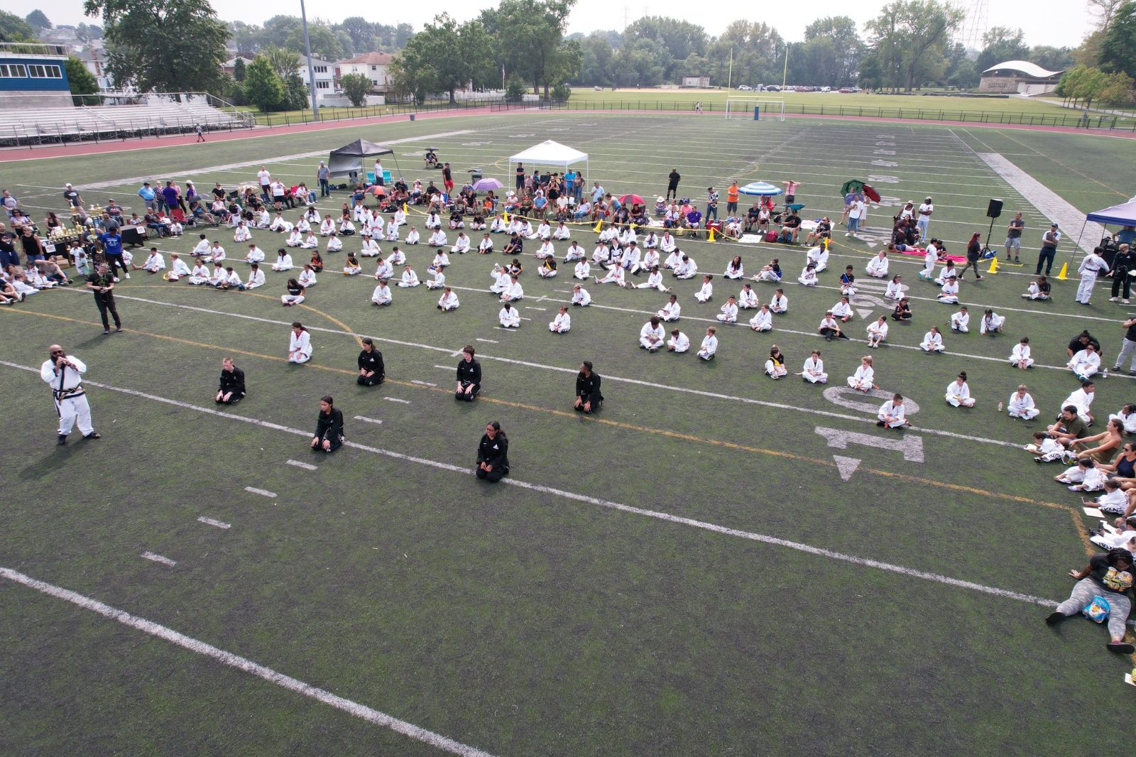 Wide shot of students and families at the event at the ZENTAI Mega Belt Promotion in New Jersey