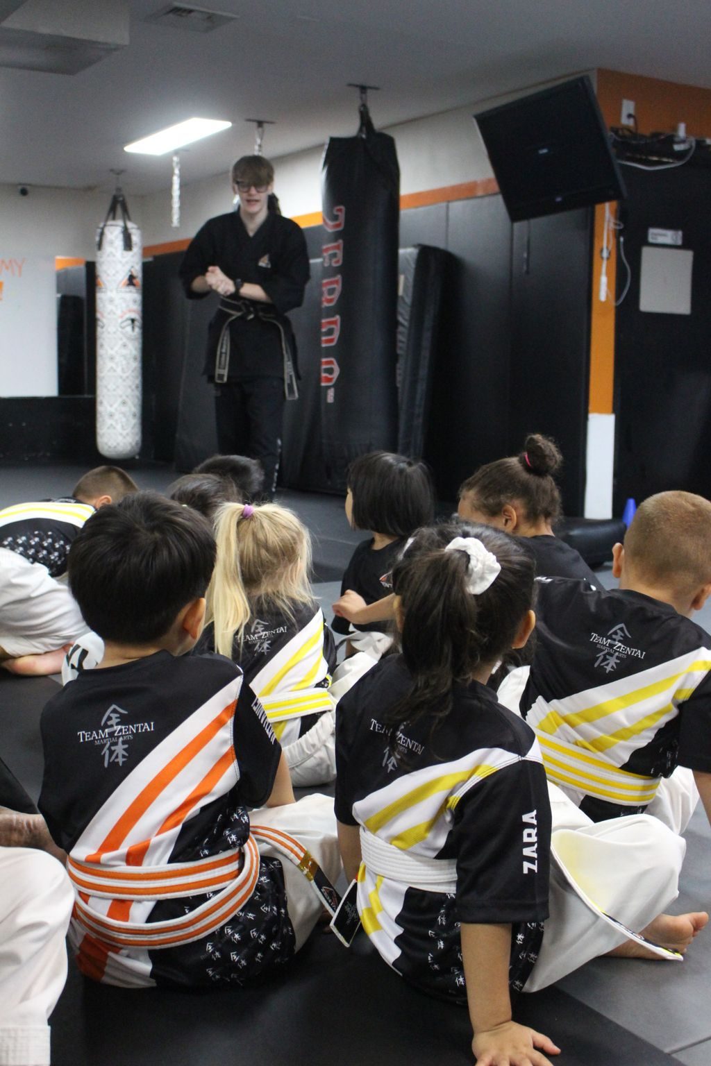 Kids seated together during class at ZENTAI Martial Arts in North Arlington, NJ