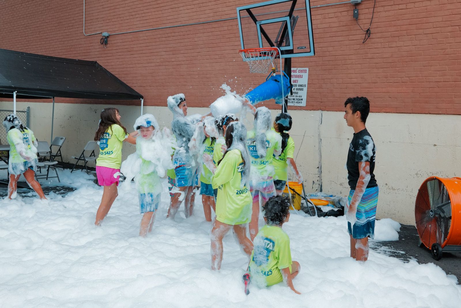 Campers playing in foam at ZENTAI summer camp in New Jersey