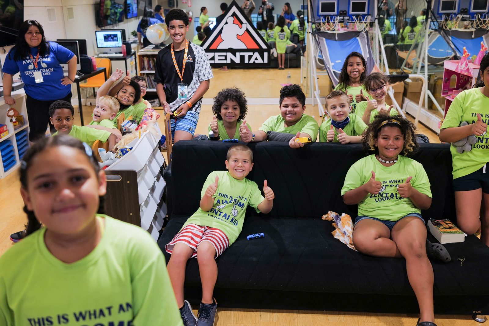 Campers relaxing together on a couch at ZENTAI summer camp in New Jersey