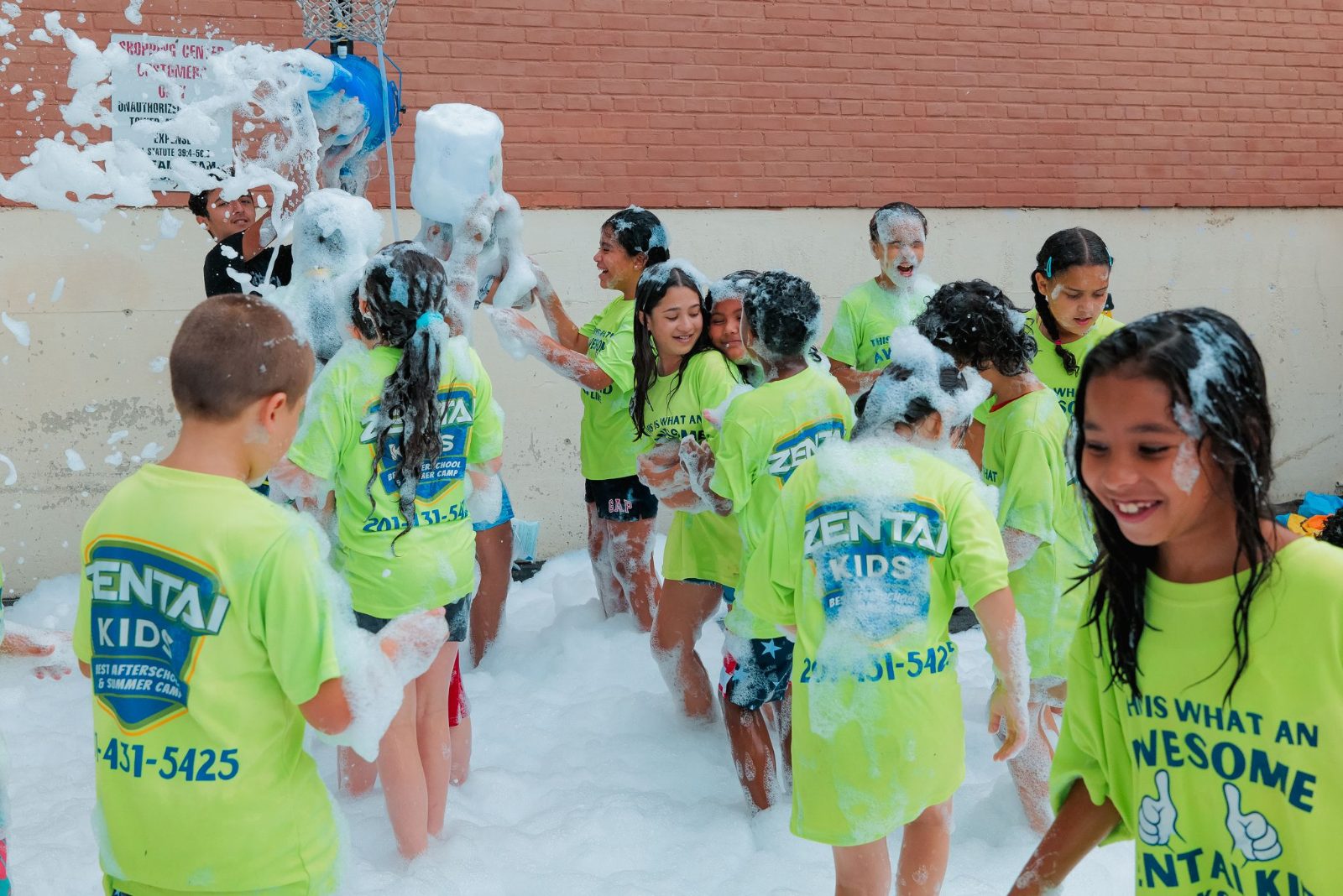 Campers laughing in the foam at ZENTAI summer camp in New Jersey