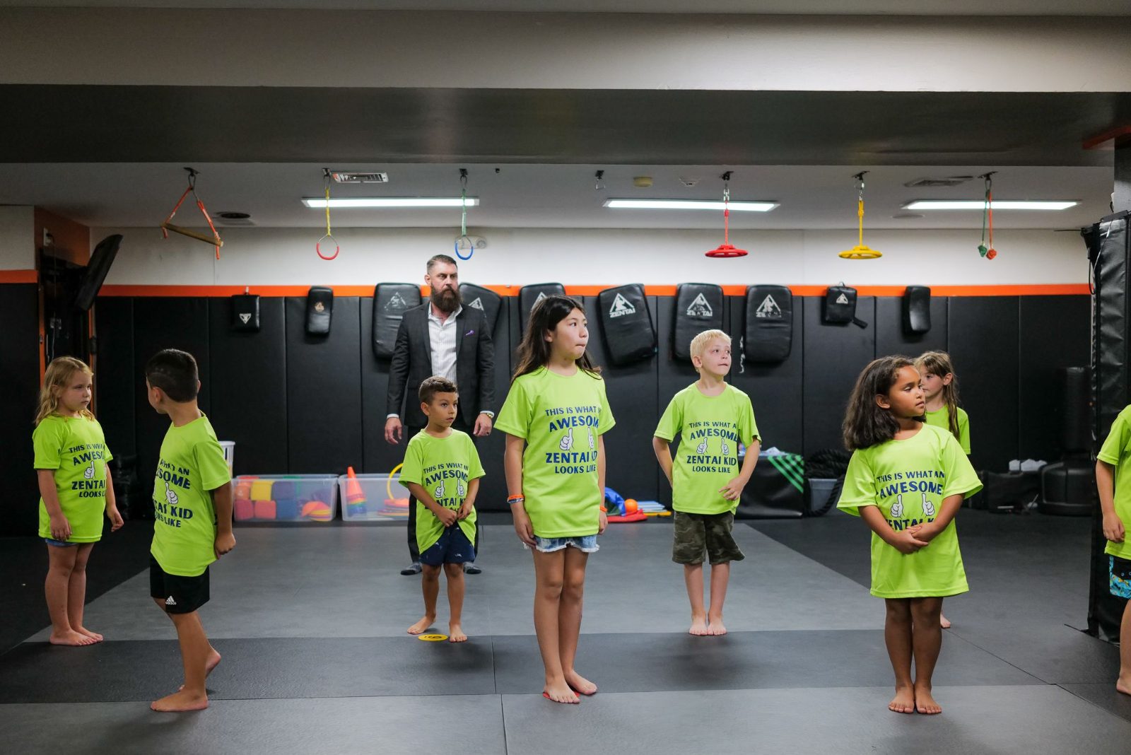 Campers lined up in the dojo, seen from behind at ZENTAI summer camp in New Jersey