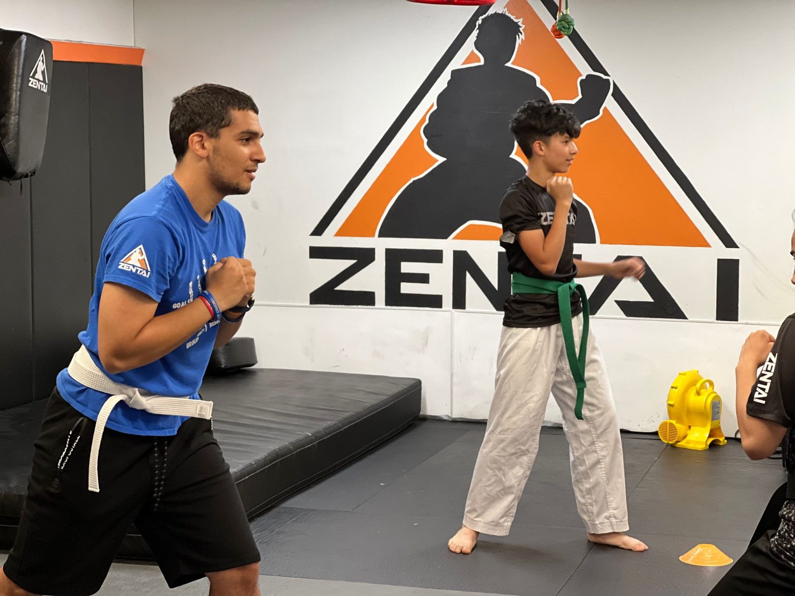 Teen training with an instructor at ZENTAI Martial Arts in New Jersey